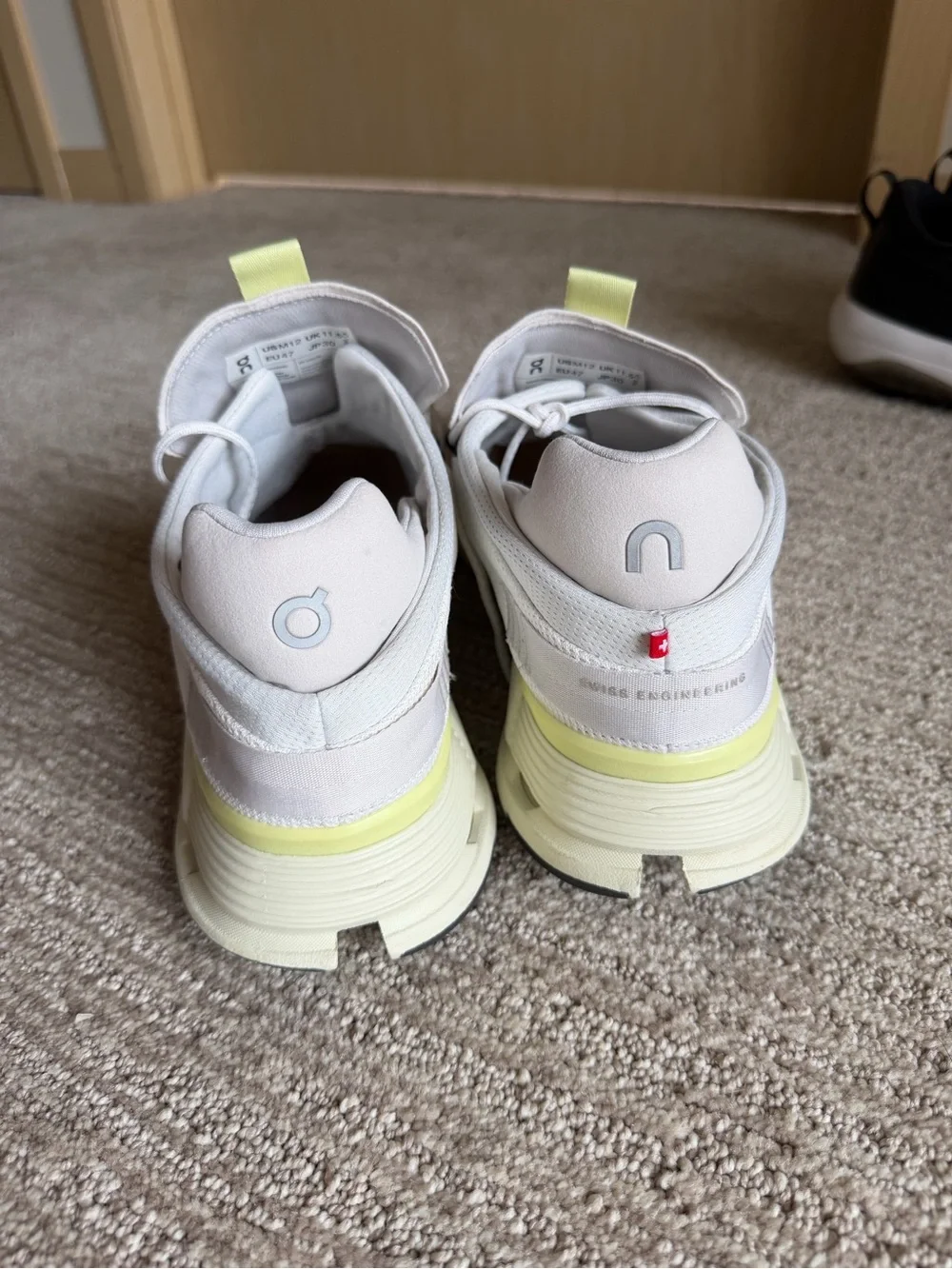 On Running Men’s Sneakers in White with Pale Yellow Accents